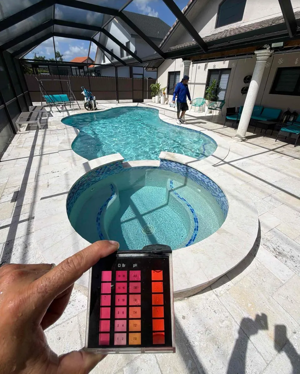 Testing chlorine and pH at a screened-in pool and spa