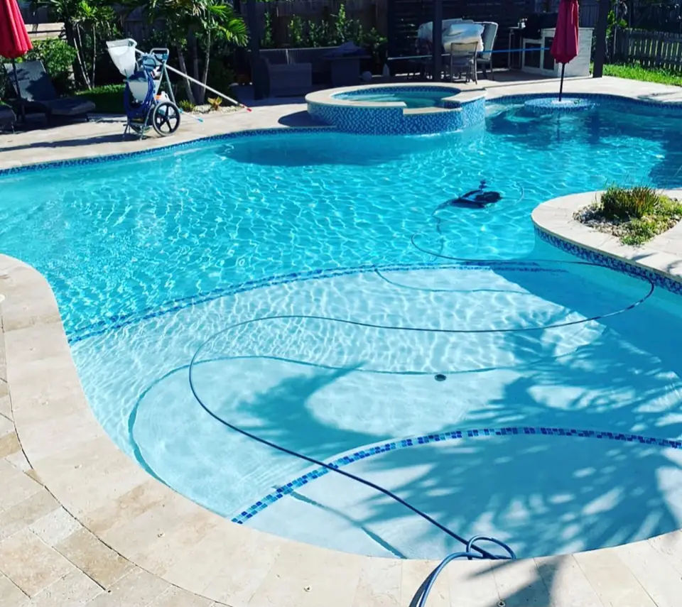 Freeform pool with spa
